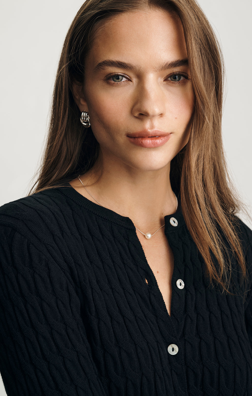 EDITION CABLE-KNIT CARDIGAN IN BLACK