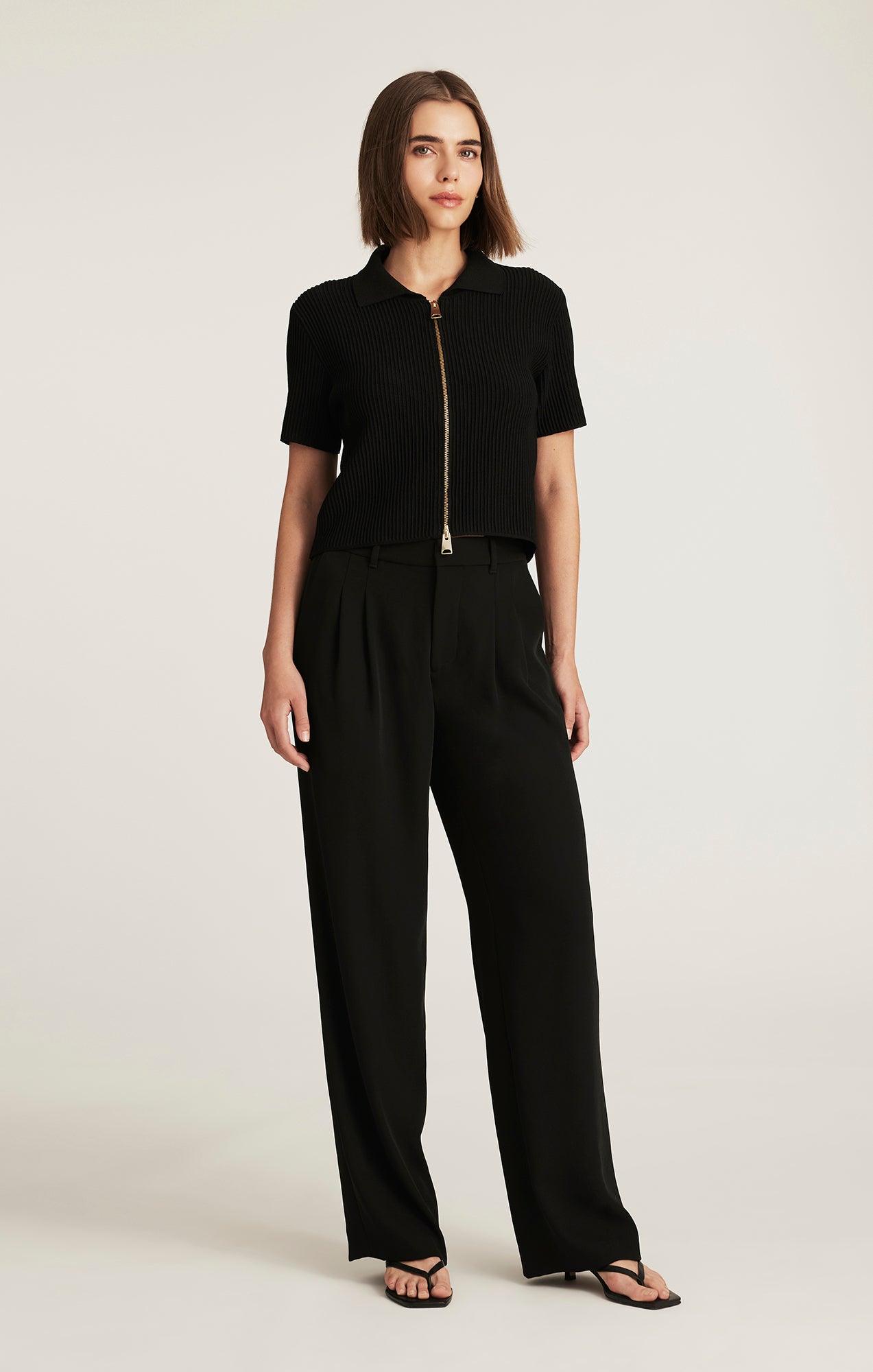 EDITION SHORT SLEEVE FULL ZIP SWEATER IN BLACK