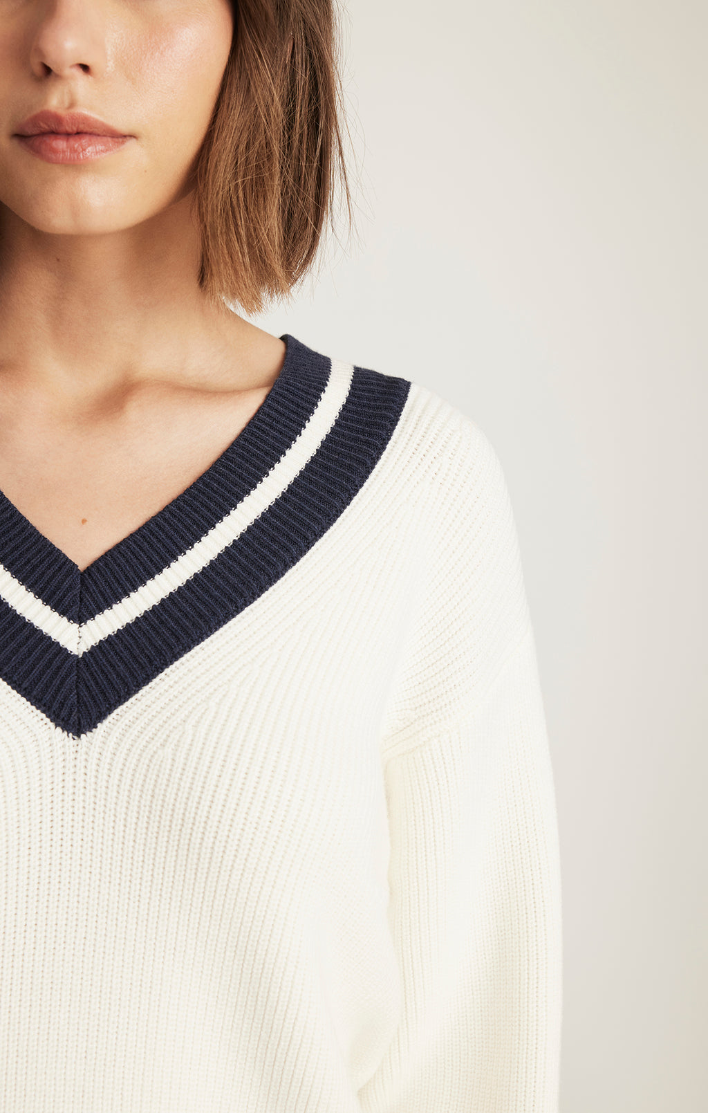 VARSITY V-NECK SWEATER IN ANTIQUE WHITE