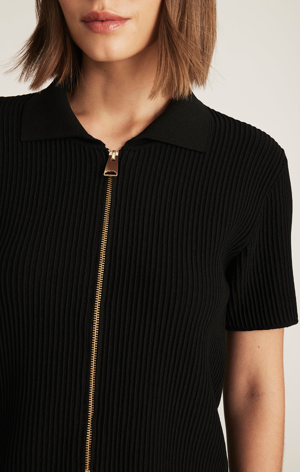EDITION SHORT SLEEVE FULL ZIP SWEATER IN BLACK