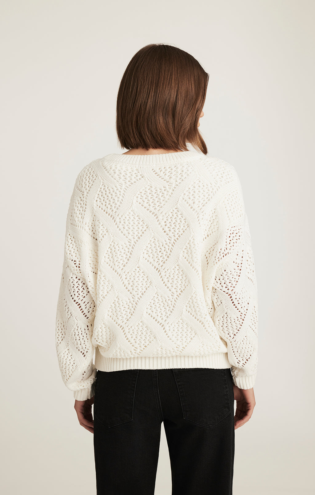 CABLE-KNIT SWEATER IN ANTIQUE WHITE