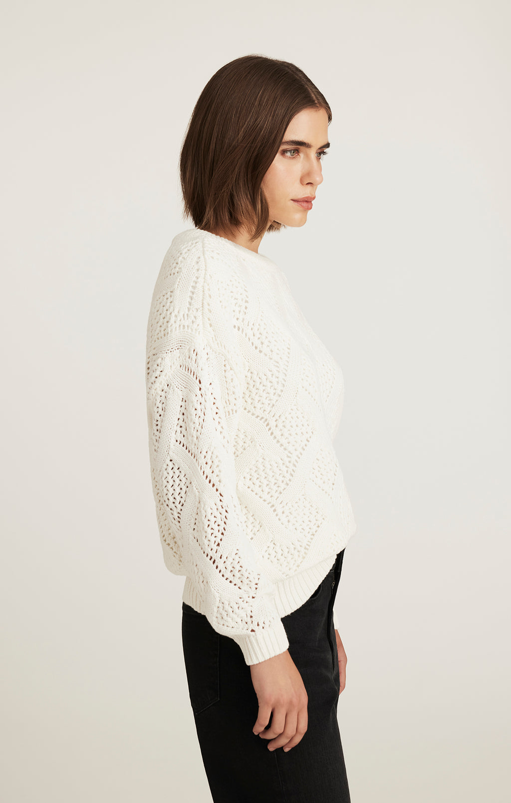 CABLE-KNIT SWEATER IN ANTIQUE WHITE