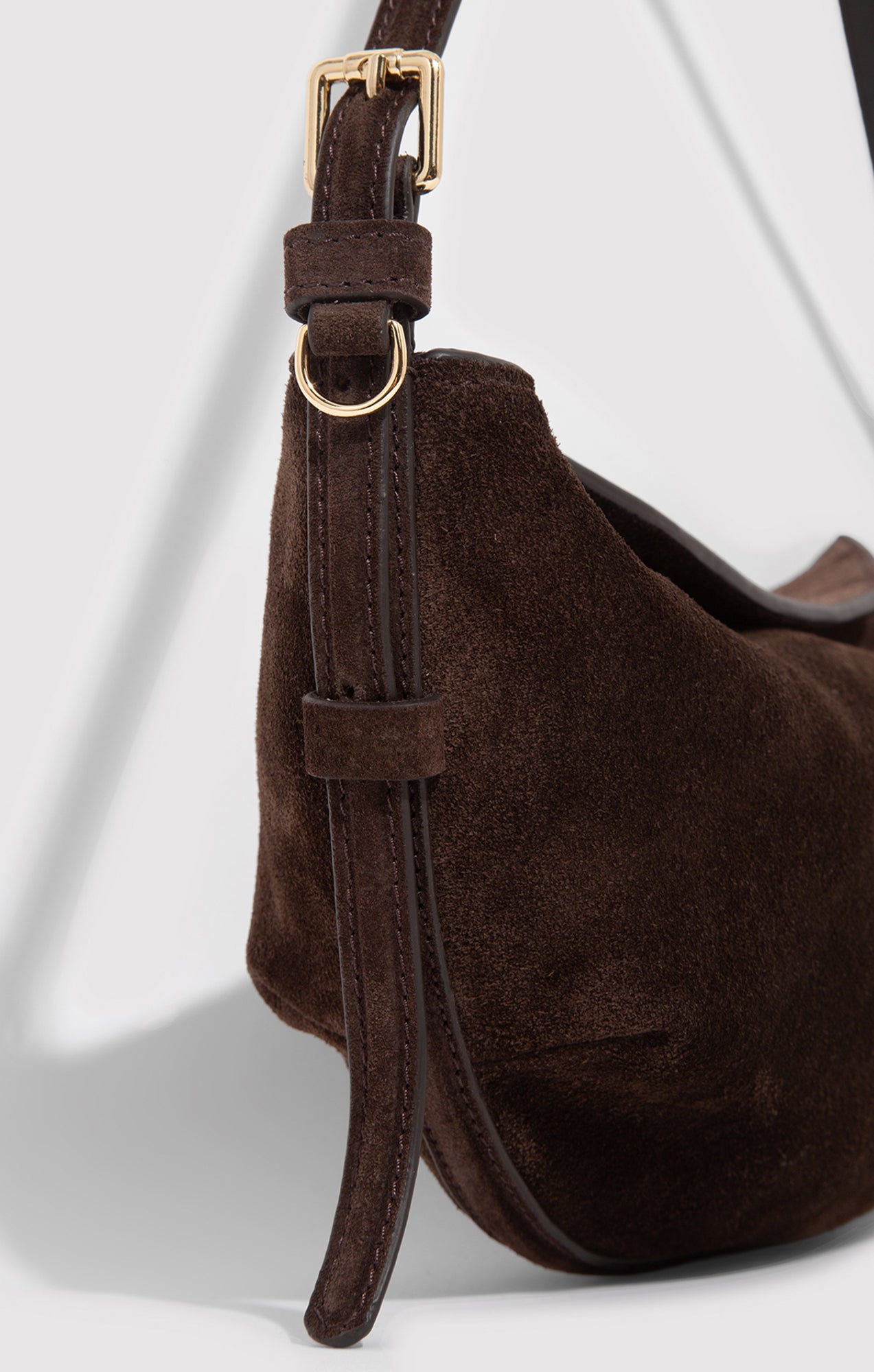 SUEDE CRESCENT BAG IN TORTOISE SHELL