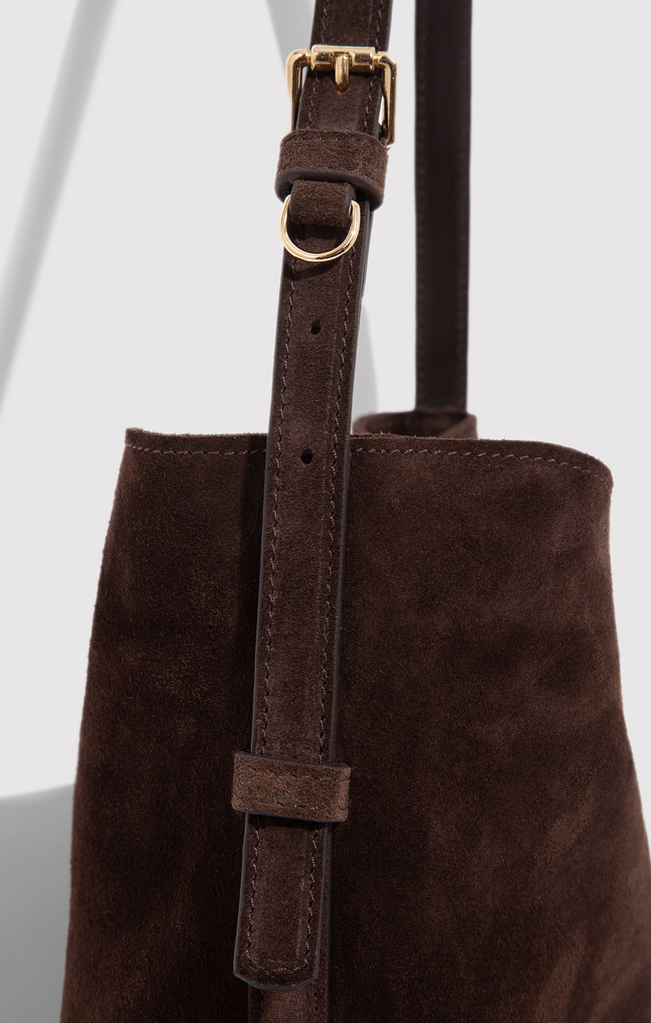 SUEDE BUCKET BAG IN TORTOISE SHELL