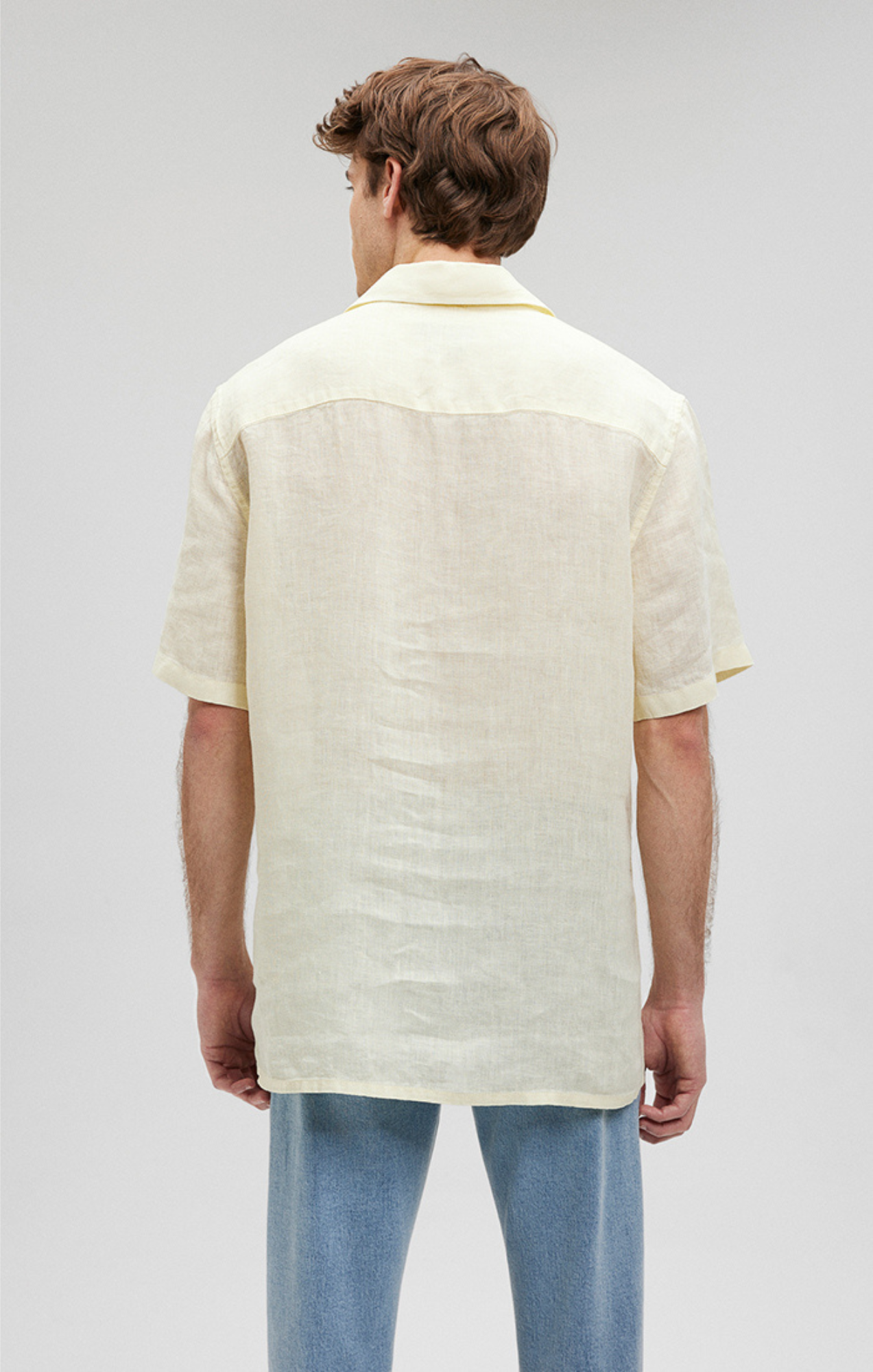 white top yellow sleeves
