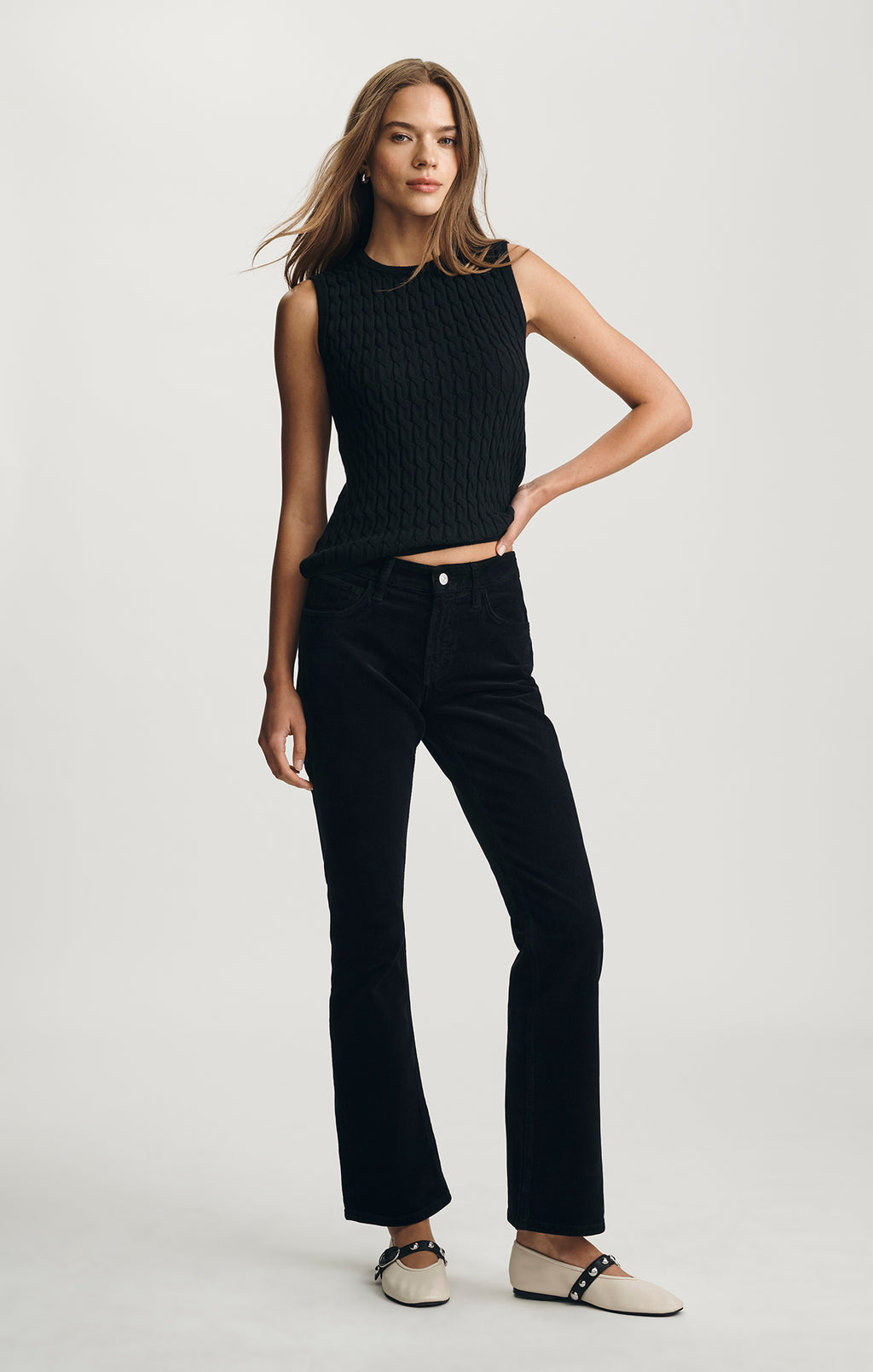 EDITION CABLE-KNIT SWEATER VEST IN BLACK