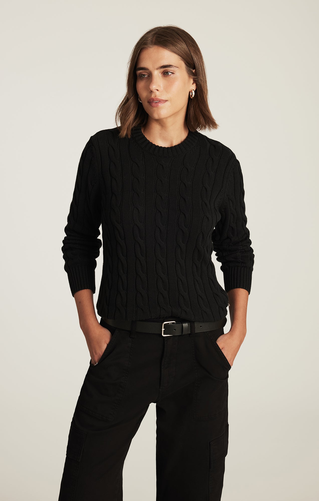 CABLE-KNIT CREW NECK SWEATER IN BLACK