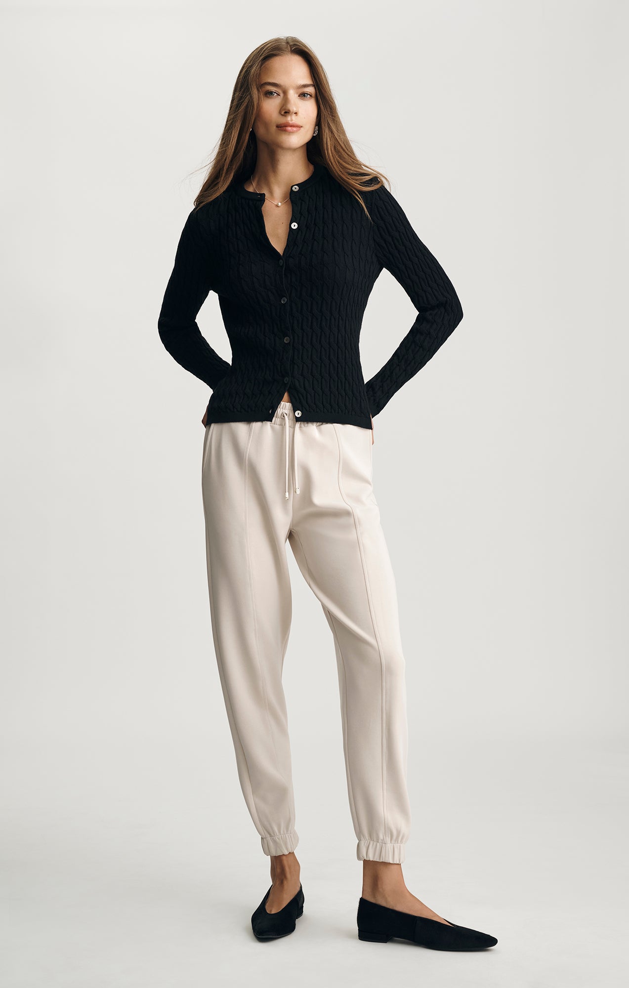 EDITION CABLE-KNIT CARDIGAN IN BLACK