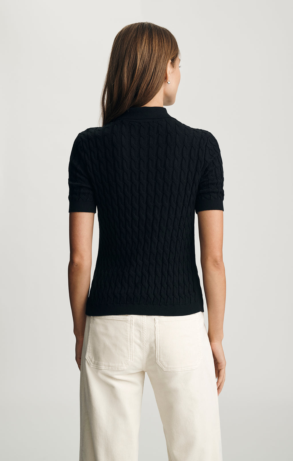 EDITION CABLE-KNIT POLO SWEATER IN BLACK