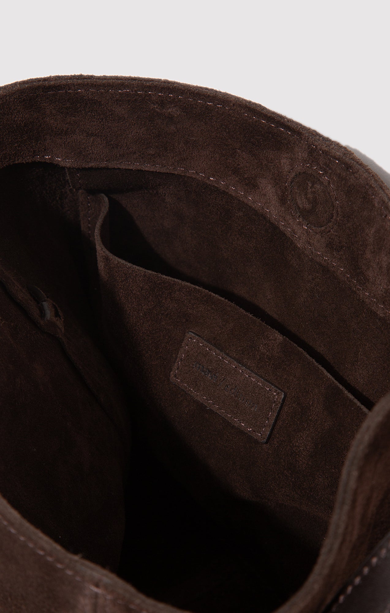 SUEDE BUCKET BAG IN TORTOISE SHELL