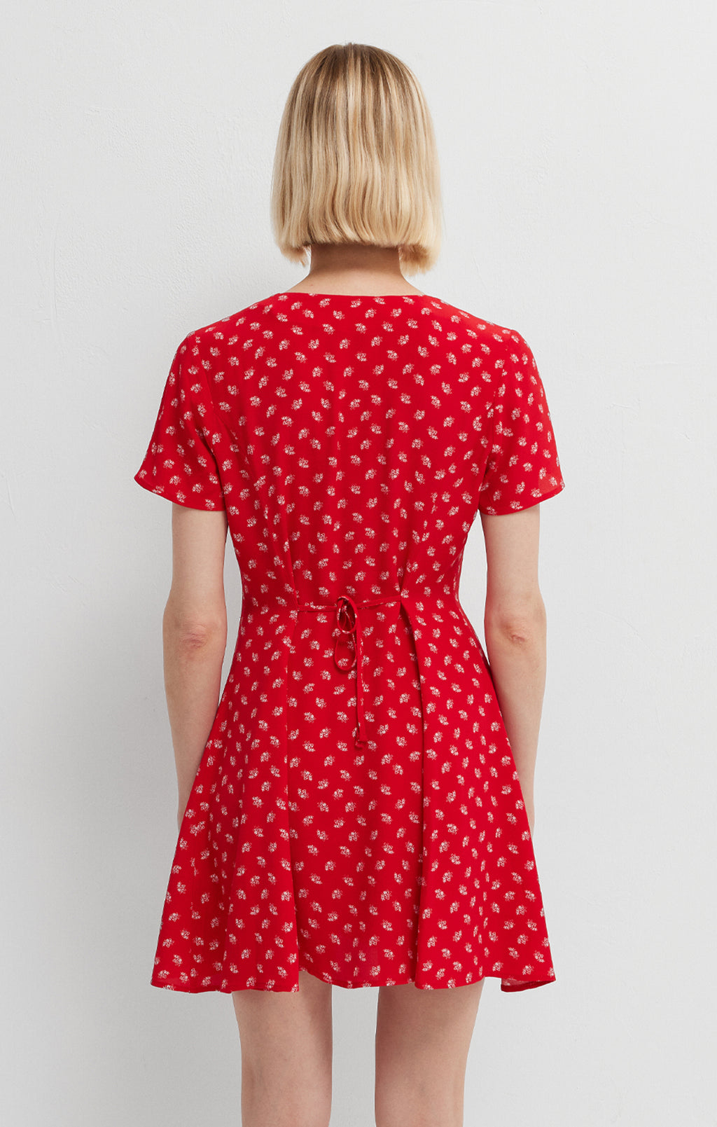 BUTTON-FRONT MINI DRESS IN URBAN RED PETAL PRINT