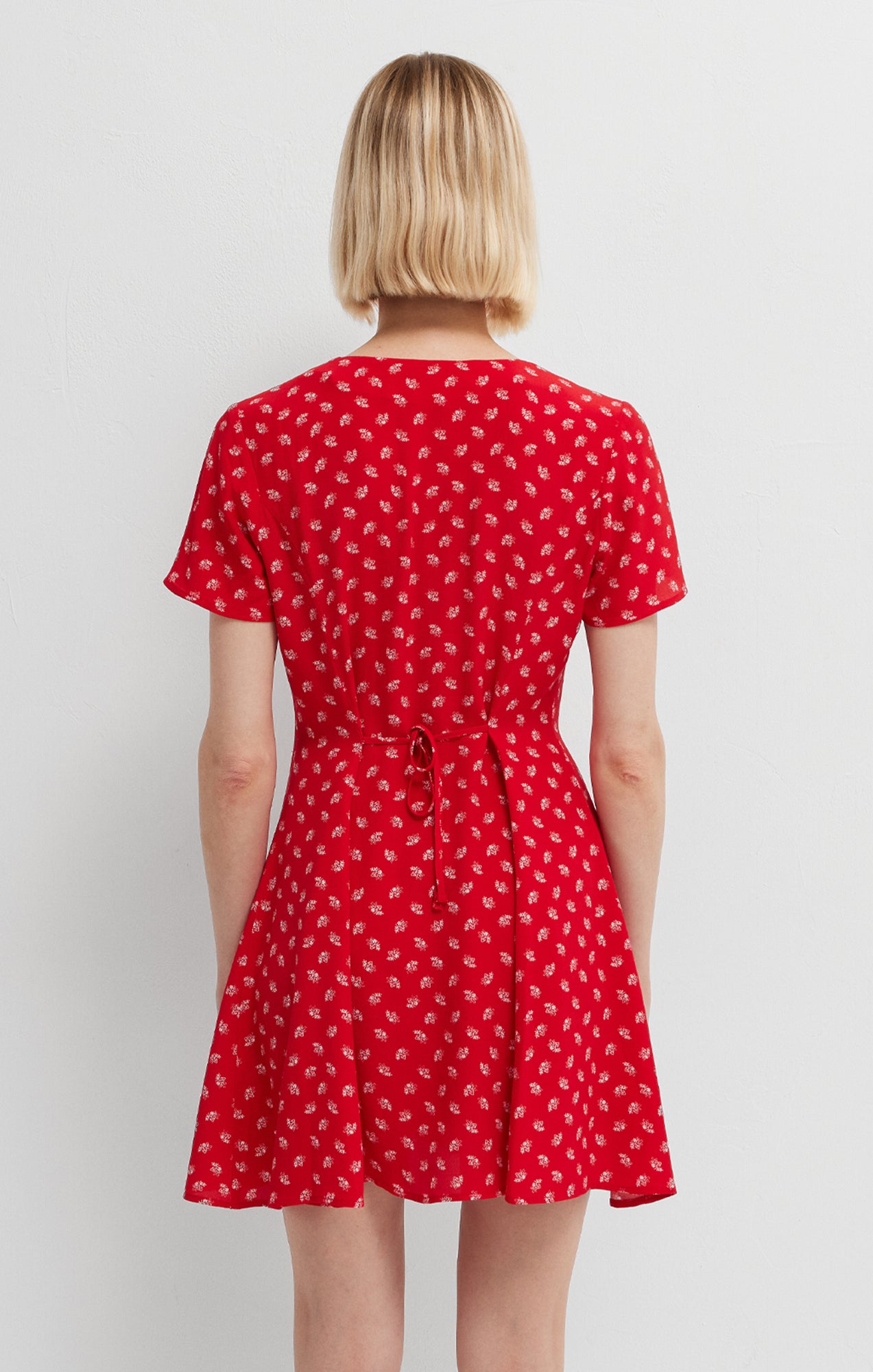 BUTTON-FRONT MINI DRESS IN URBAN RED PETAL PRINT