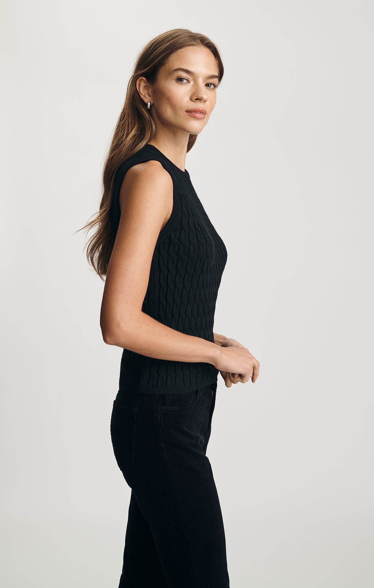 EDITION CABLE-KNIT SWEATER VEST IN BLACK